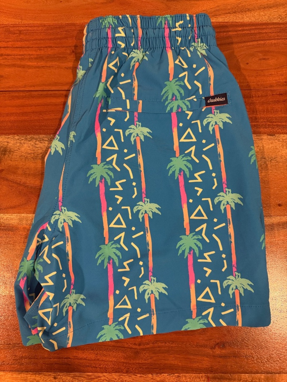 Chubbies 5.5 inseam Teal Tropical Palm Swim Short with Neon Accents